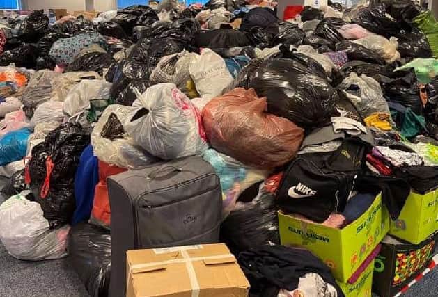 Just one of the massive piles of donations from the community