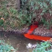 A mysterious red streak into the river near Parsons Close recreation ground last week