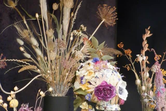 A close up of some of the floral creations featured in the display