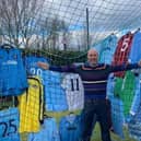 Mark McCarthy with some of his incredible collection