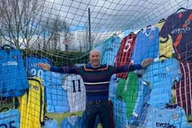 Mark McCarthy with some of his incredible collection