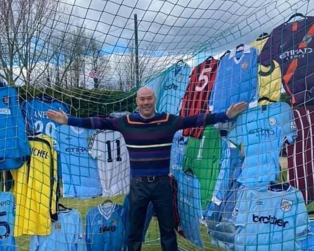 Mark McCarthy with some of his incredible collection