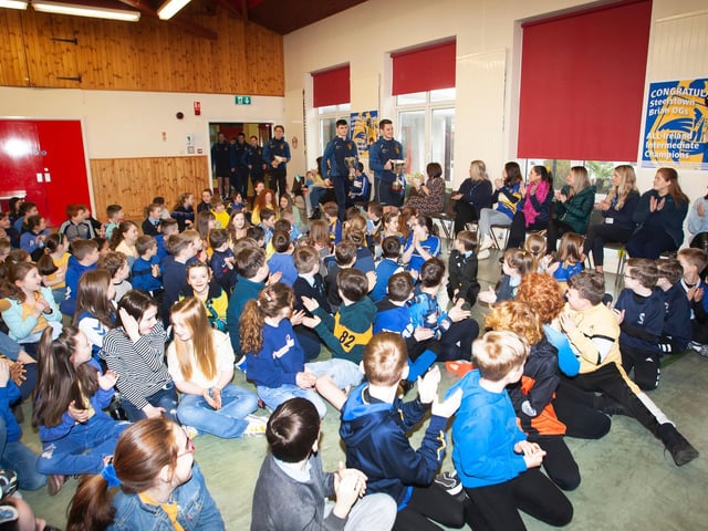 A rapturous reception for the successful Steelstown Brian Og's players at Hollybush Primary School last week. (Photos: Jim McCafferty Photography)