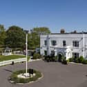Woughton House Hotel in Milton Keynes is still housing asylum seekers, despite being up for sale for £6m
