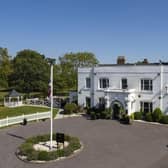 Woughton House Hotel in Milton Keynes is still housing asylum seekers, despite being up for sale for £6m