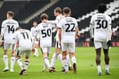MK Dons lost ground on the automatic promotion places after a poor defeat at Grimsby Town.