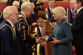 Queen Camilla presented the award to Open University heads