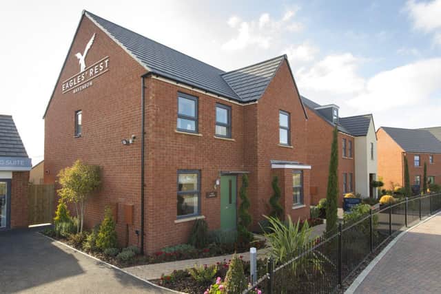 DWSM - A typical street scene at a Barratt and David Wilson Homes development in Milton Keynes.