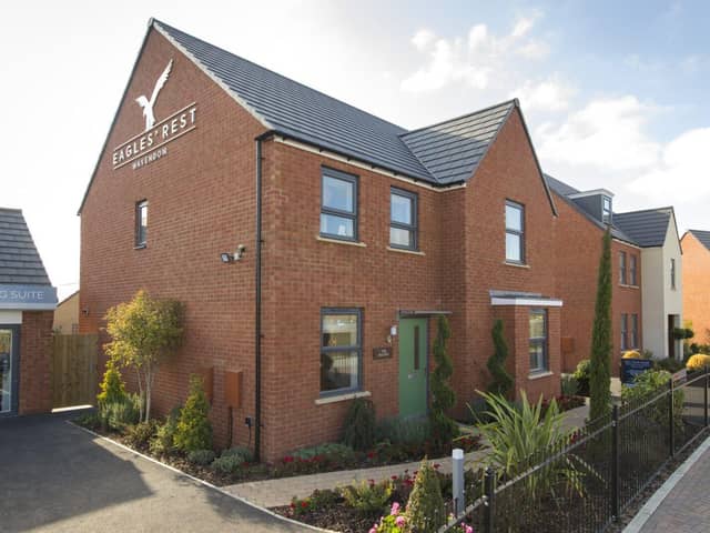 DWSM - A typical street scene at a Barratt and David Wilson Homes development in Milton Keynes.