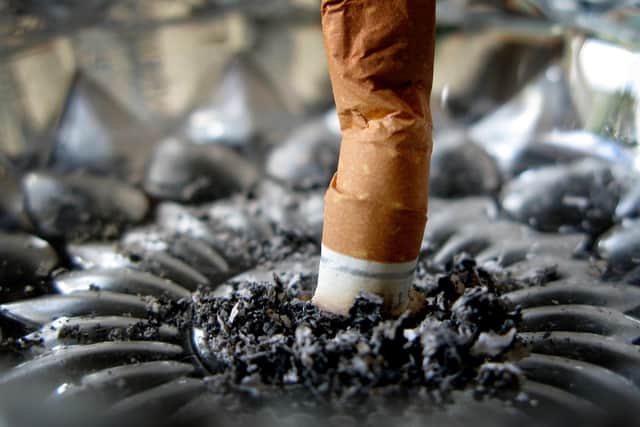 Generic stock picture of a cigarette stubbed out in an ashtray.