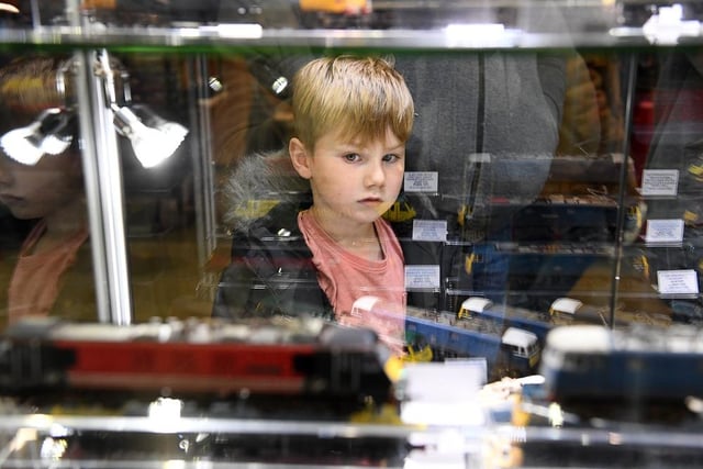 This little lad was entranced by the model trains
