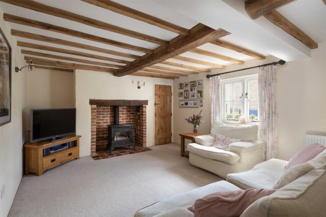 The cottage features entrance hall, lounge with log burner and  second reception room with feature fireplace.
