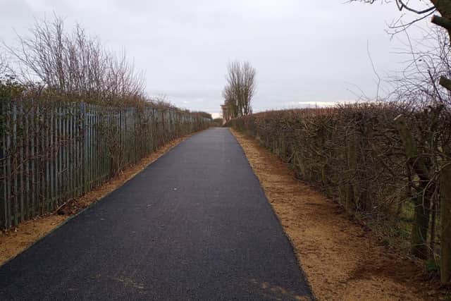 The finished surface includes drainage units made from permeable recycled tyre rubber