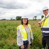 Bellway's Senior Sales Manager Lindsey Davenport and Contracts Manager Peter Bourne putting the first spade in the ground at Bellway’s Whitehouse Park development in MK