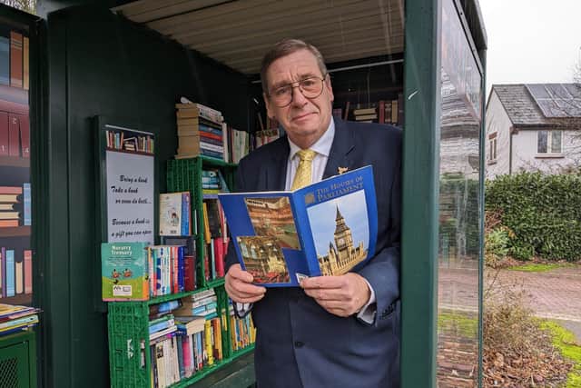 Cllr Paul Trendall enjoying one of the repurposed bus shelters