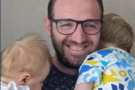 Author Gareth Ellis with his two children