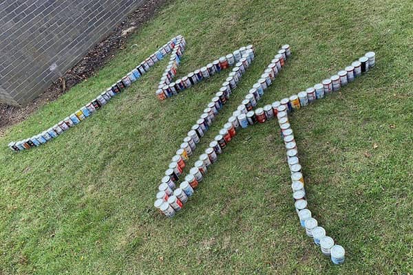 The city's Food Bank is attempting to smash the world record for the longest line of cans in Milton Keynes today (Monday)
