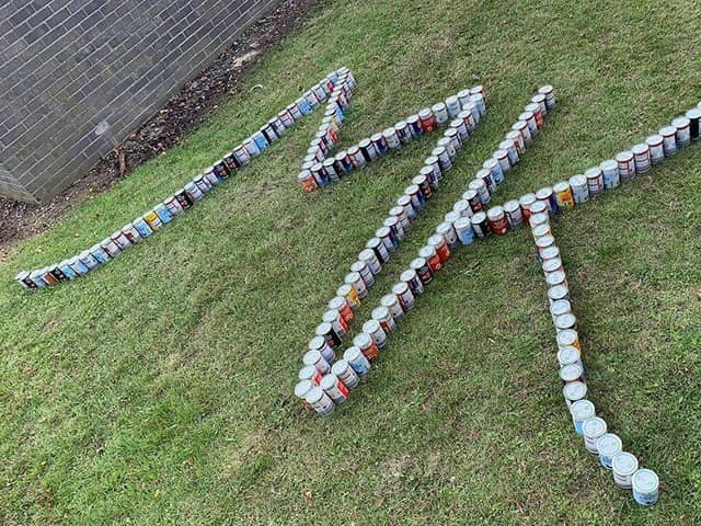 The city's Food Bank is attempting to smash the world record for the longest line of cans in Milton Keynes today (Monday)