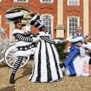 Cinderella 2023 cast, enjoying a game of tug of war ahead of the Milton Keynes Theatre production, photo from Jane Russell