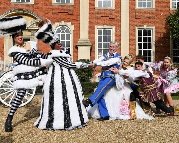 Cinderella 2023 cast, enjoying a game of tug of war ahead of the Milton Keynes Theatre production, photo from Jane Russell