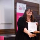 Sue Webb, left, Clinical Lead Admiral Nurse, one of the city council’s specialist dementia nurses receives her award from Dame Elizabeth Anionwu