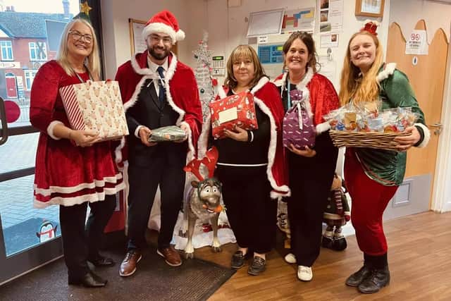 Cllr Joe Hearnshaw, Cabinet member for Children and Young People, with staff at The Saplings Family Centre in Bletchley