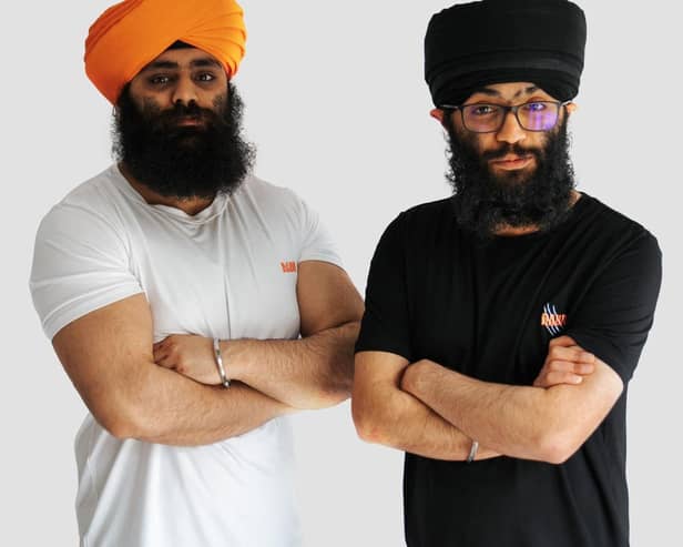 Davinder and son Jeevan model the RAUR T-shirts