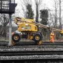 Workers put the final touches on the new rail track at Bletchley this summer