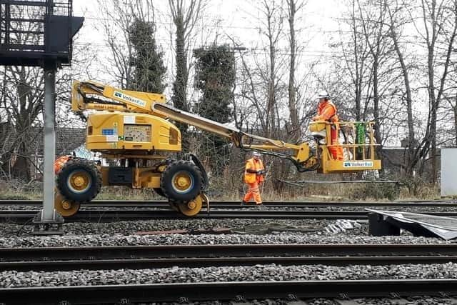 Workers put the final touches on the new rail track at Bletchley this summer