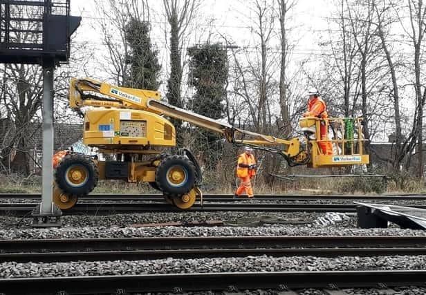 Workers put the final touches on the new rail track at Bletchley this summer
