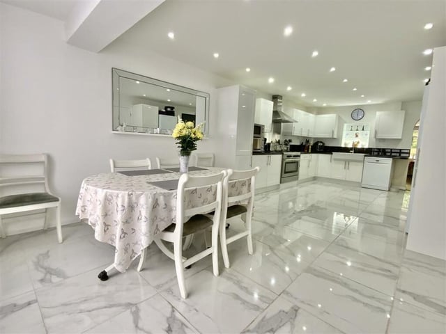 There's an open plan kitchen/dining/family area