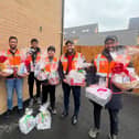 Young Muslims from AMYA prepare to spread the Christmas cheer in Milton Keynes