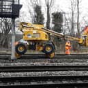 Workers put the final touches on the new rail track at Bletchley