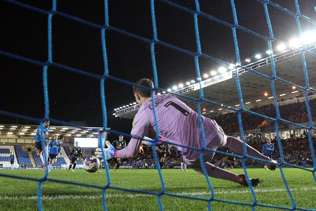 Made a few good stops to keep the score civil, while made an excellent penalty save to keep out Jonson Clarke-Harris. Dons' best player for a second consecutive game.