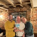 Aiden and Owen of the Chequers flank MK and North Bucks CAMRA Chair David Martin