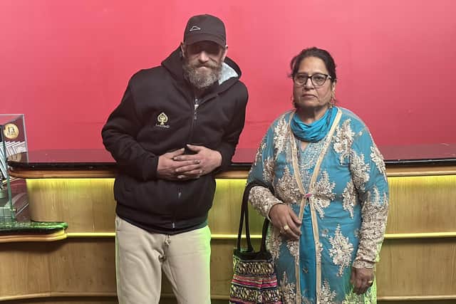 Richard says Razia Hamid has inspired he and son Arif to give back to the community. She is pictured with Danny and his faithful companion, Dizzee.