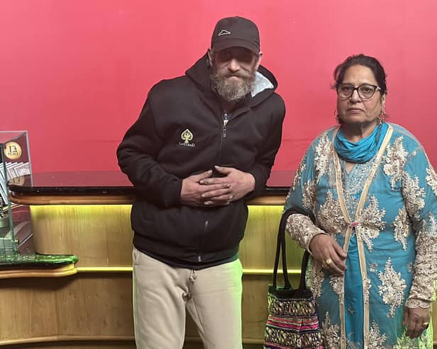 Richard says Razia Hamid has inspired he and son Arif to give back to the community. She is pictured with Danny and his faithful companion, Dizzee.