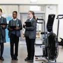 Students present their winning design of an electro bike to generate renewable kinetic energy