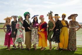 The striking hats are being auctioned online