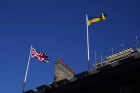 The Ukrainian flag being flown above 10 Downing Street in London