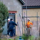 Demolition Contractors arrive at Sir Tom Moore's daughters home. Picture: James Linsell-Clark / SWNS