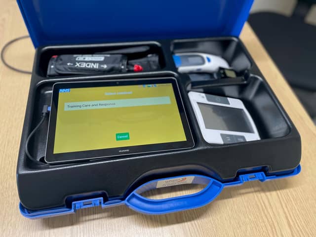 The blue box contains wireless equipment for vital health checks