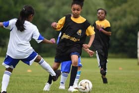 Councillors are calling for girls football to be made mandatory in schools