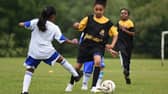 Councillors are calling for girls football to be made mandatory in schools