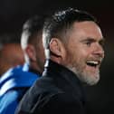 Former Motherwell manager Graham Alexander has been appointed the new head coach of MK Dons, taking over from Mark Jackson