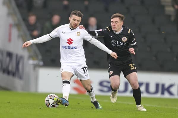MK Dons are ten points off the play-offs after defeat to Bromley.