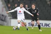 MK Dons are ten points off the play-offs after defeat to Bromley.