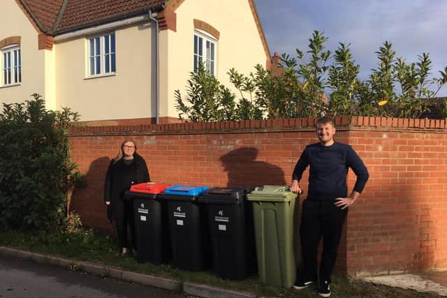 Cllr .Bradburn and Montague show the four different bins that each household in MK will have