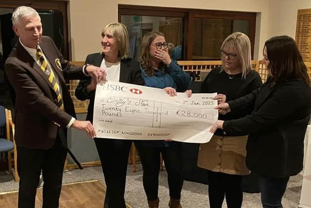 Graham Freer and Lesley Bednarek present the cheque to Emily’s Star trustees Darcy Scott-Hindmarch, Jayne Foster and Katie Mainwaring