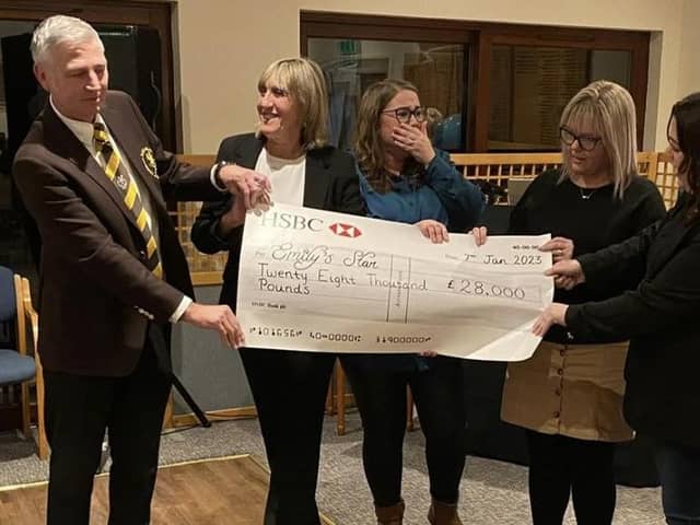 Graham Freer and Lesley Bednarek present the cheque to Emily’s Star trustees Darcy Scott-Hindmarch, Jayne Foster and Katie Mainwaring